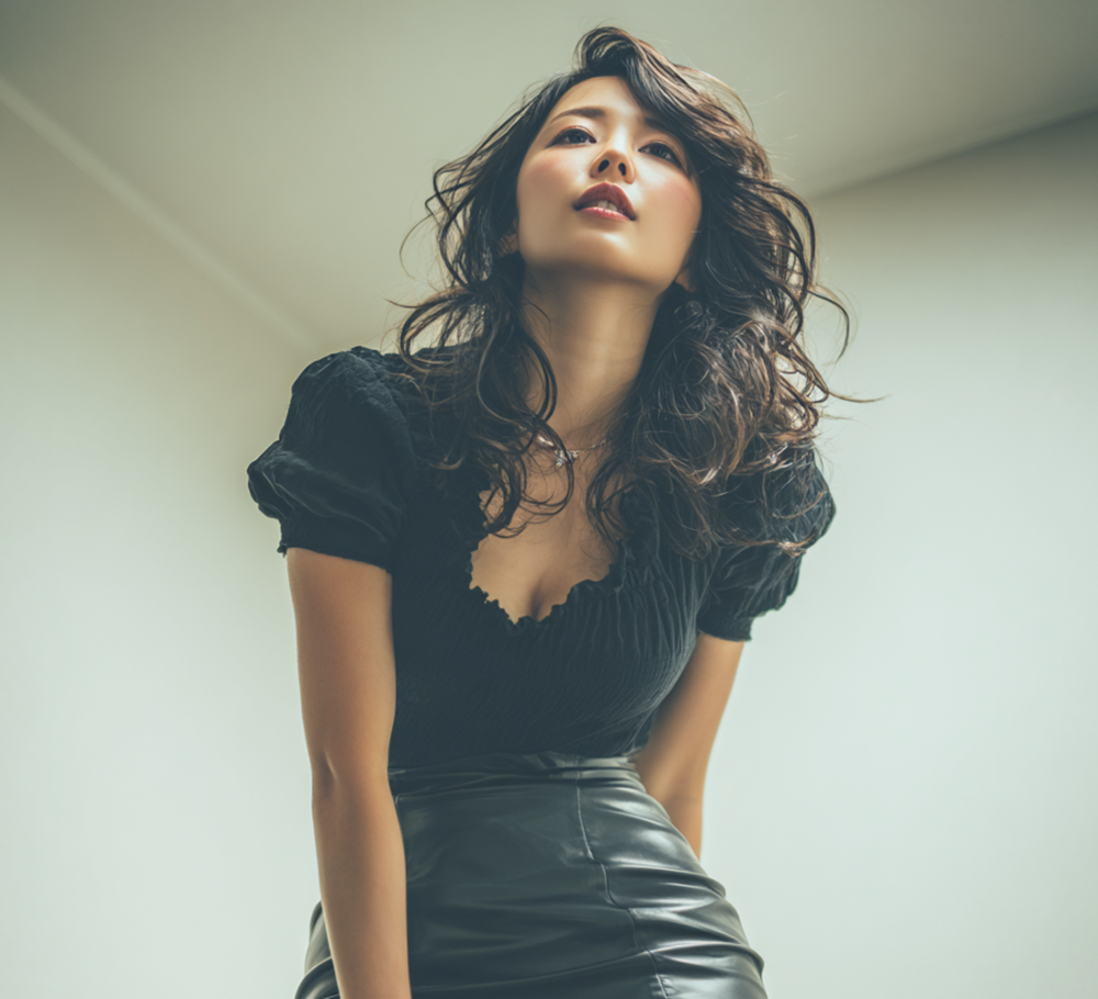 Beautiful Japanese woman in black leather mini skirt and thigh high boots, cinematic lighting, realistic skin texture, minimalist interior background, sophisticated eroticism.